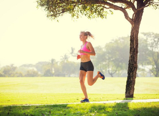 photodune-6706914-young-woman-jogging-running-outdoors-m-555x406